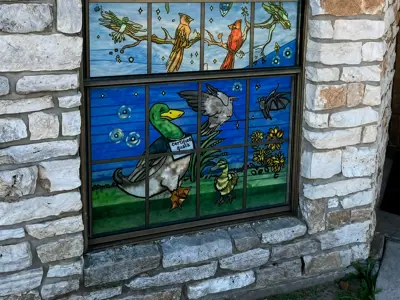Colorful Stained Glass Window With Nature Theme